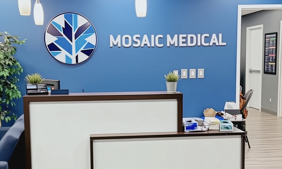Interior photo of the Mosaic Medical office front desk.